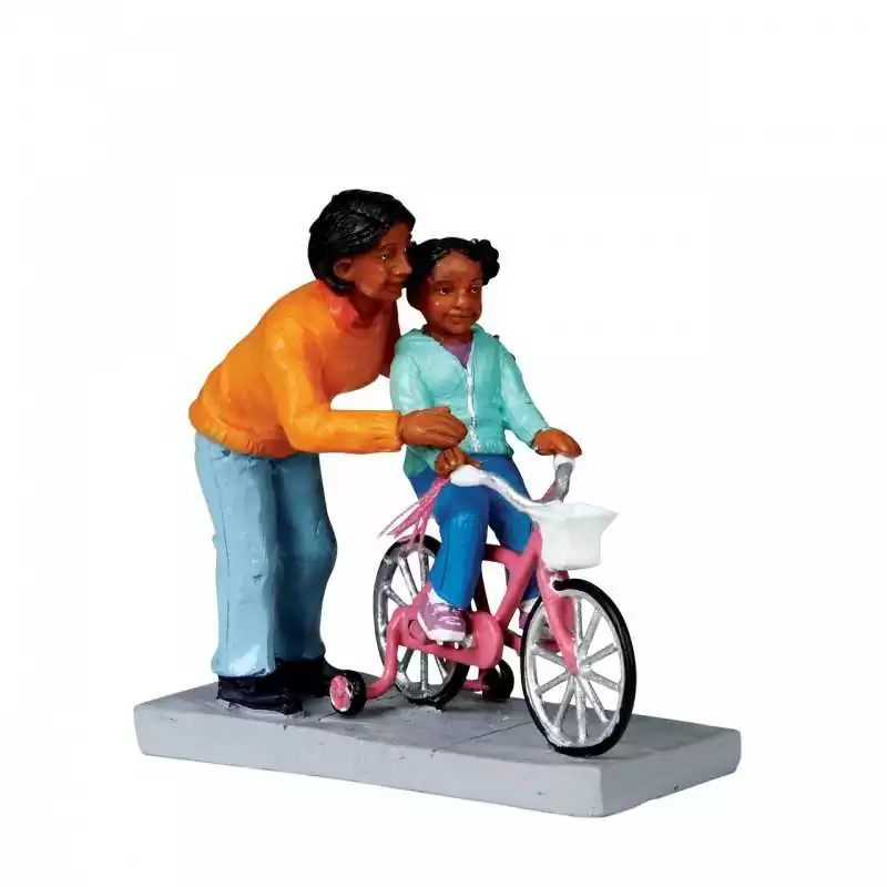 La mamma insegna ad andare in bici - Mom Lends A Helping Hand - Lemax 02759 - Il patio store